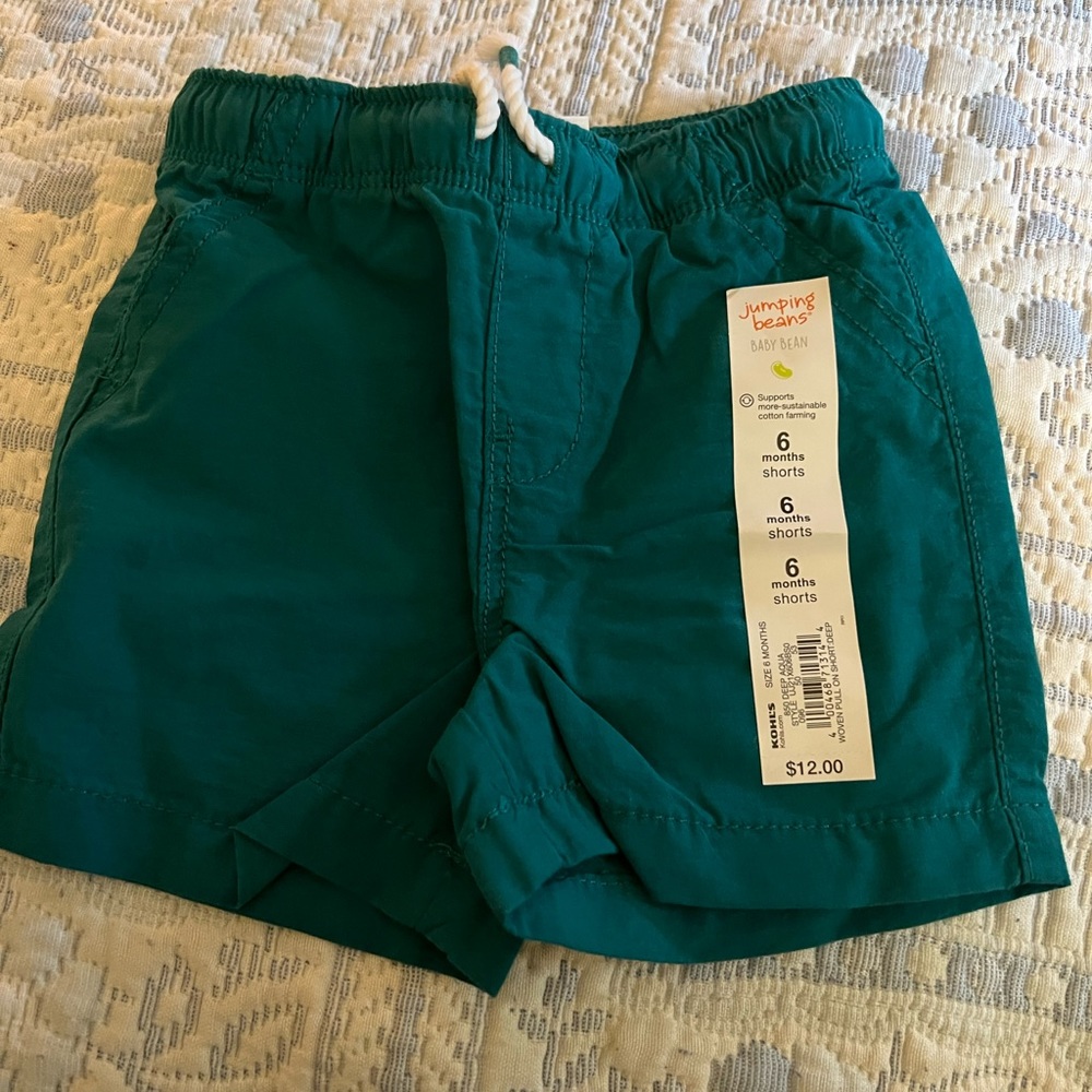 New green babies six months shorts with a drawstring and no pockets